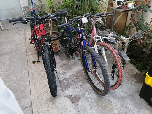 Taller de bicicletas Yumil-Bej